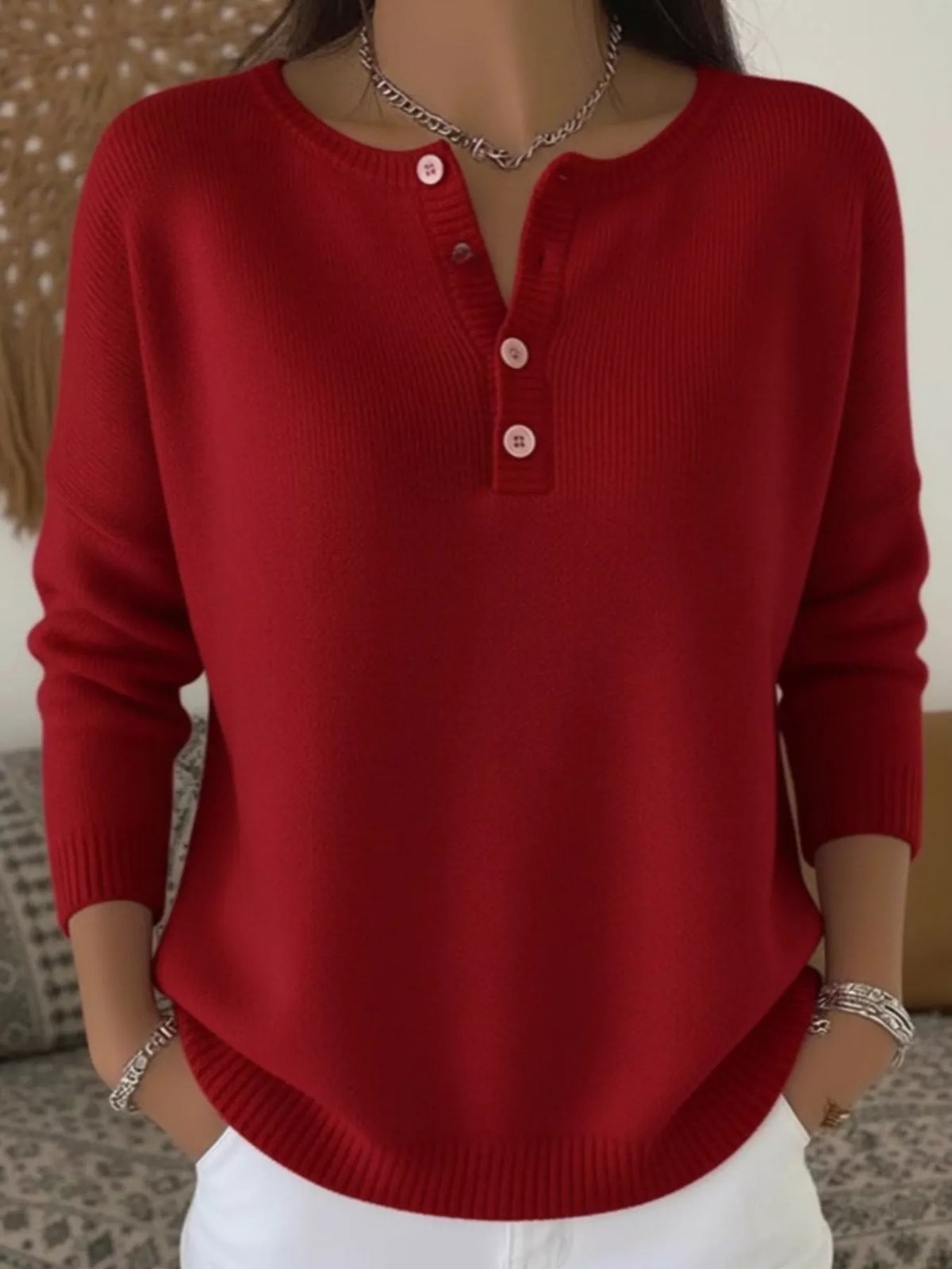 Plus size ribbed knit sweater with button details, featuring a cozy, fitted design and long sleeves in a versatile style.