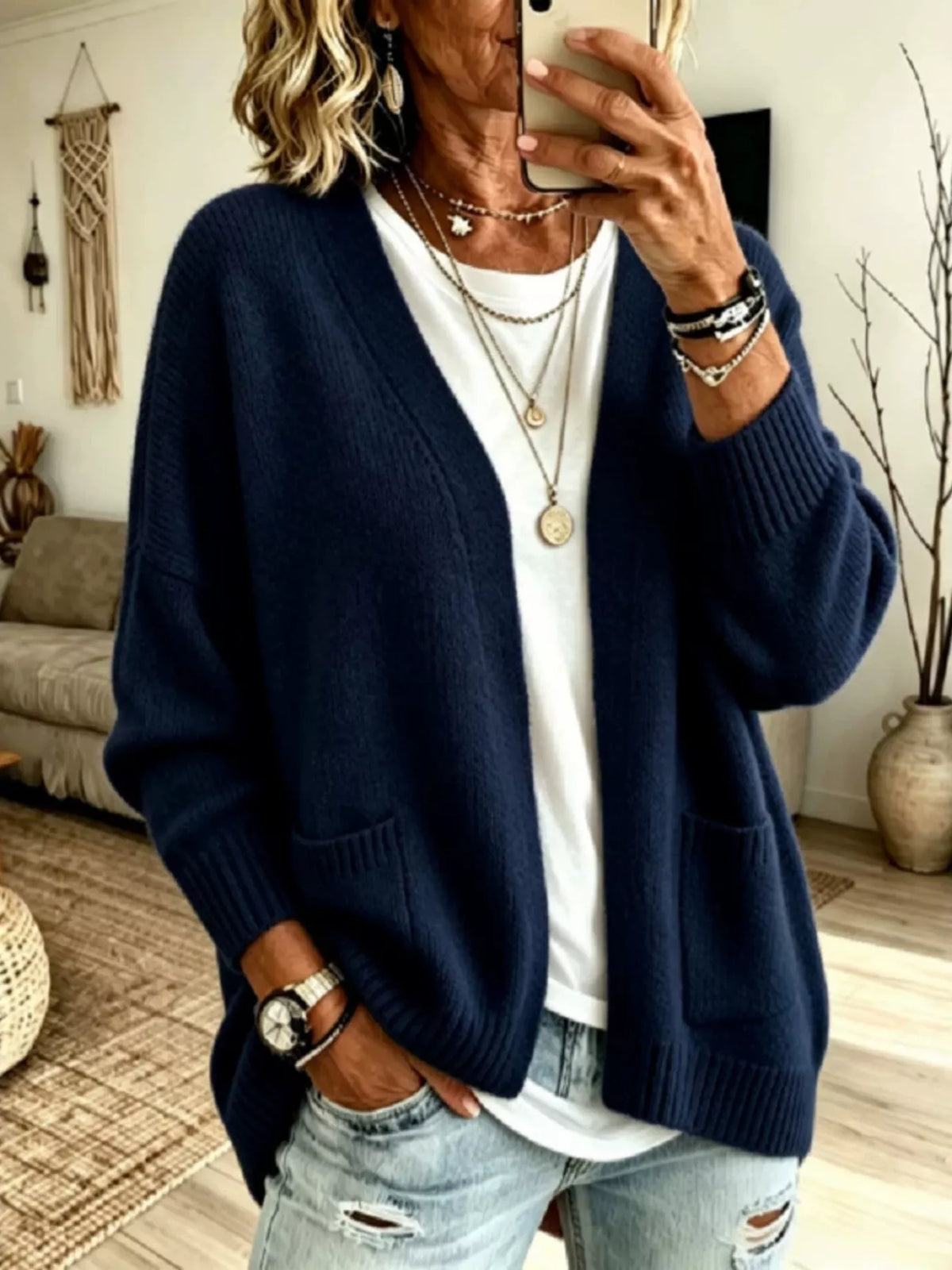 Open front knit cardigan with pockets from Trendsi, featuring a cozy, casual style in a soft, textured fabric.
