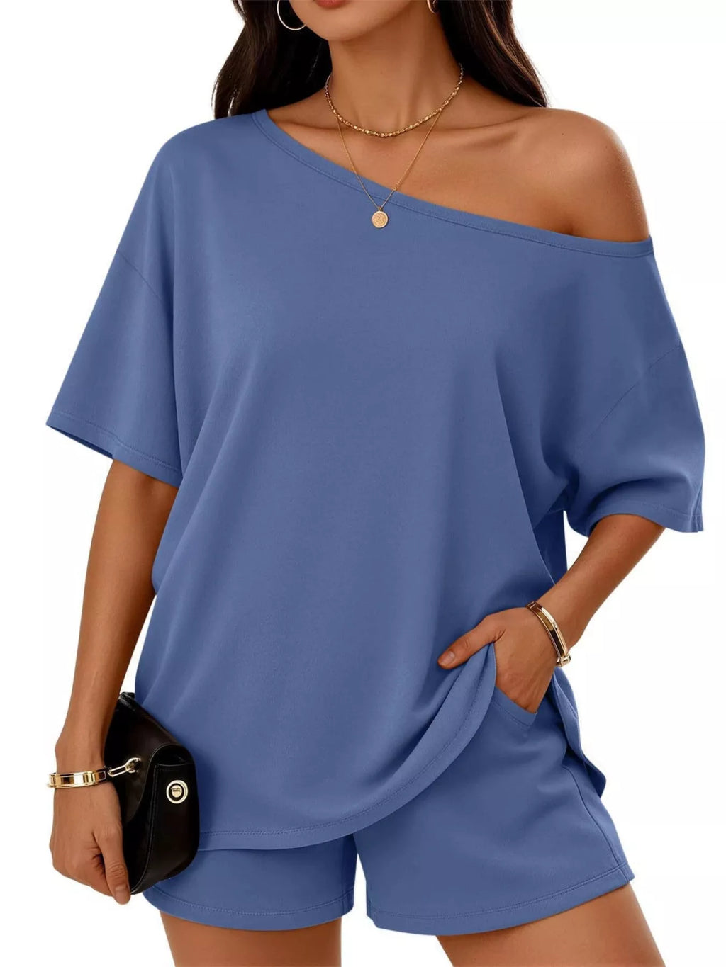 Plus size one-shoulder top and shorts set by Trendsi, featuring a stylish full-size casual outfit with a fitted top and matching shorts.