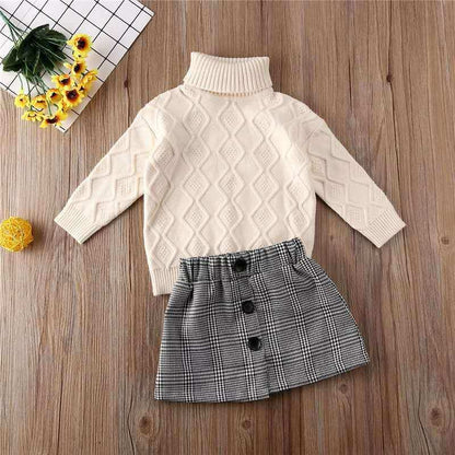 Turtleneck sweater + plaid skirt suitThis elegant suit features a turtleneck sweater and plaid skirt, perfect for any occasion. Long sleeves provide warmth, while the cotton fabric guarantees comfort. WGirls 2 piece setPlush Fashions ShopPlush Fashion Shop