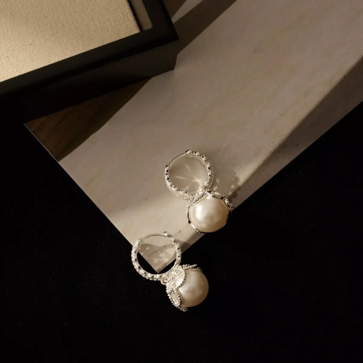 Pearl hoop earrings with zircon accents, stylish jewelry by Plush Fashion Hub featuring elegant pearl and sparkling zircon details.