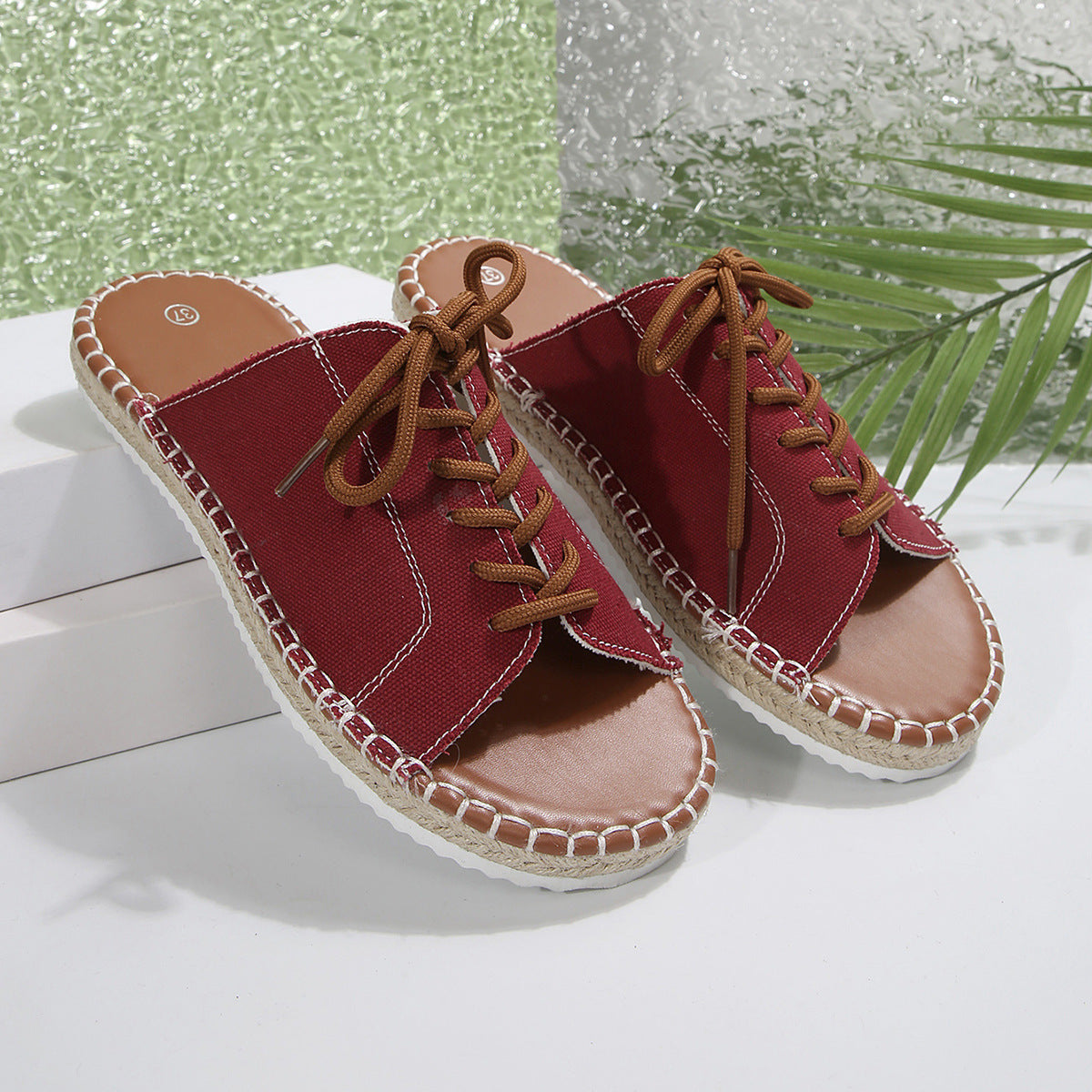 Women’s faux leather lace-up open toe flat sandals by Plush Fashion Hub, featuring stylish design and comfortable flat sole.