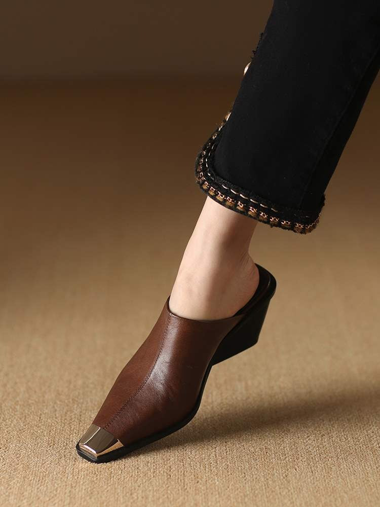 Elegant genuine leather heeled mules in tan with a sleek design, featuring a comfortable block heel from Plush Fashion Hub.