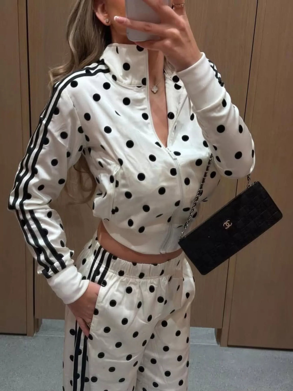 Plush Fashion Hub polka dot zip-up outerwear and pants matching set, featuring a stylish polka dot pattern and comfortable fit.