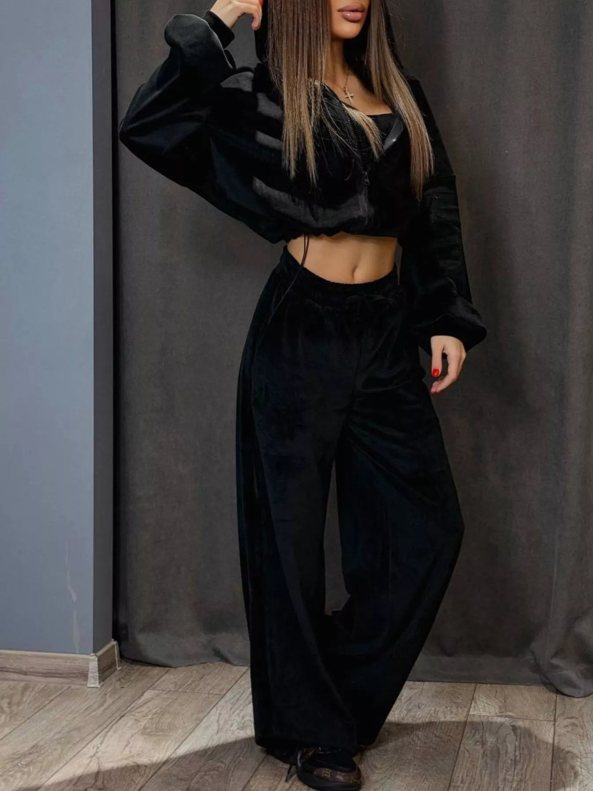 Plush Fashion Hub zip-up cropped outerwear and pants set, featuring a matching stylish tracksuit with a fitted jacket and tapered pants.