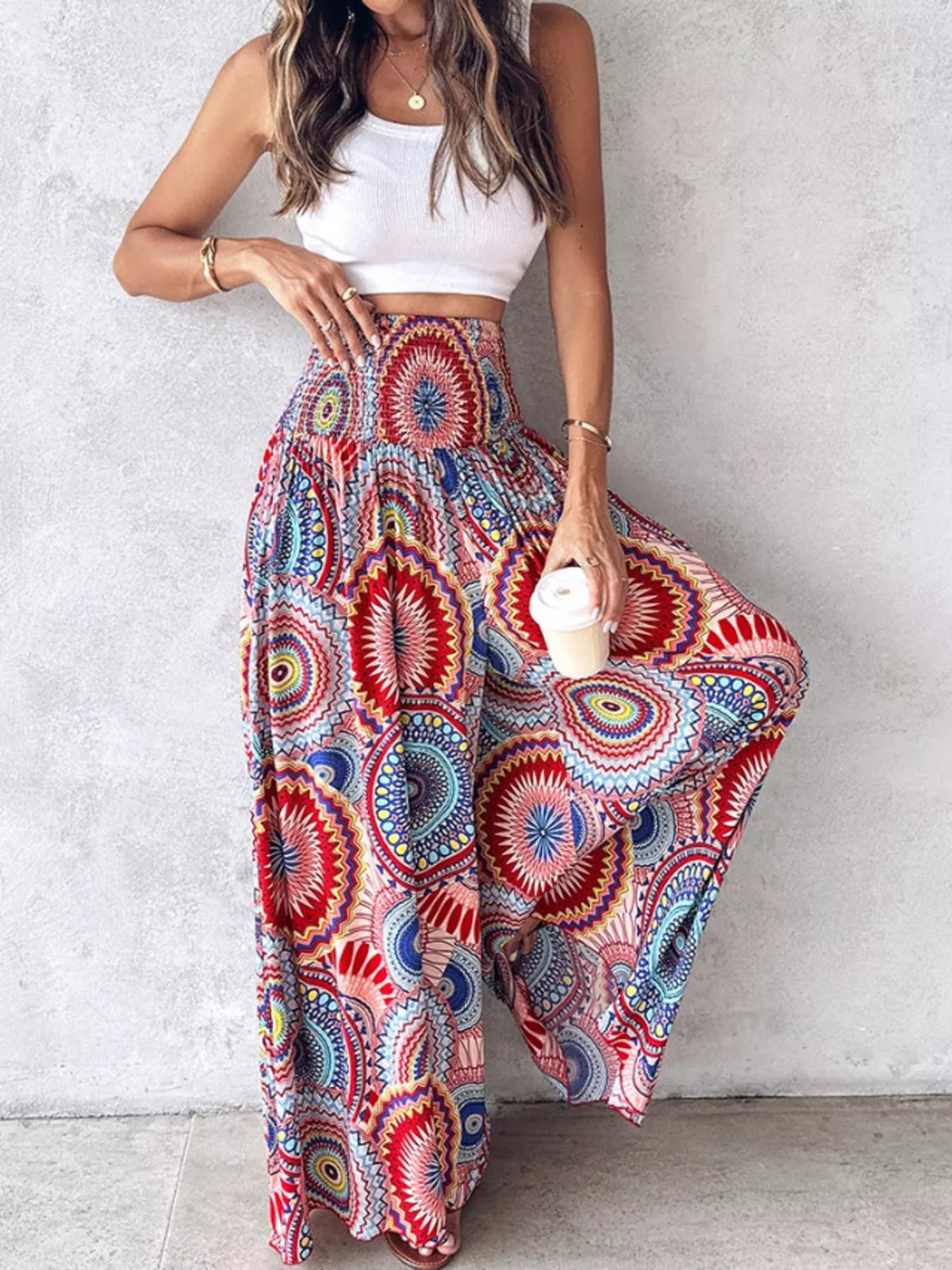 Printed wide-leg pants from Plush Fashion Hub featuring a comfortable fit and vibrant pattern, shown on a model.