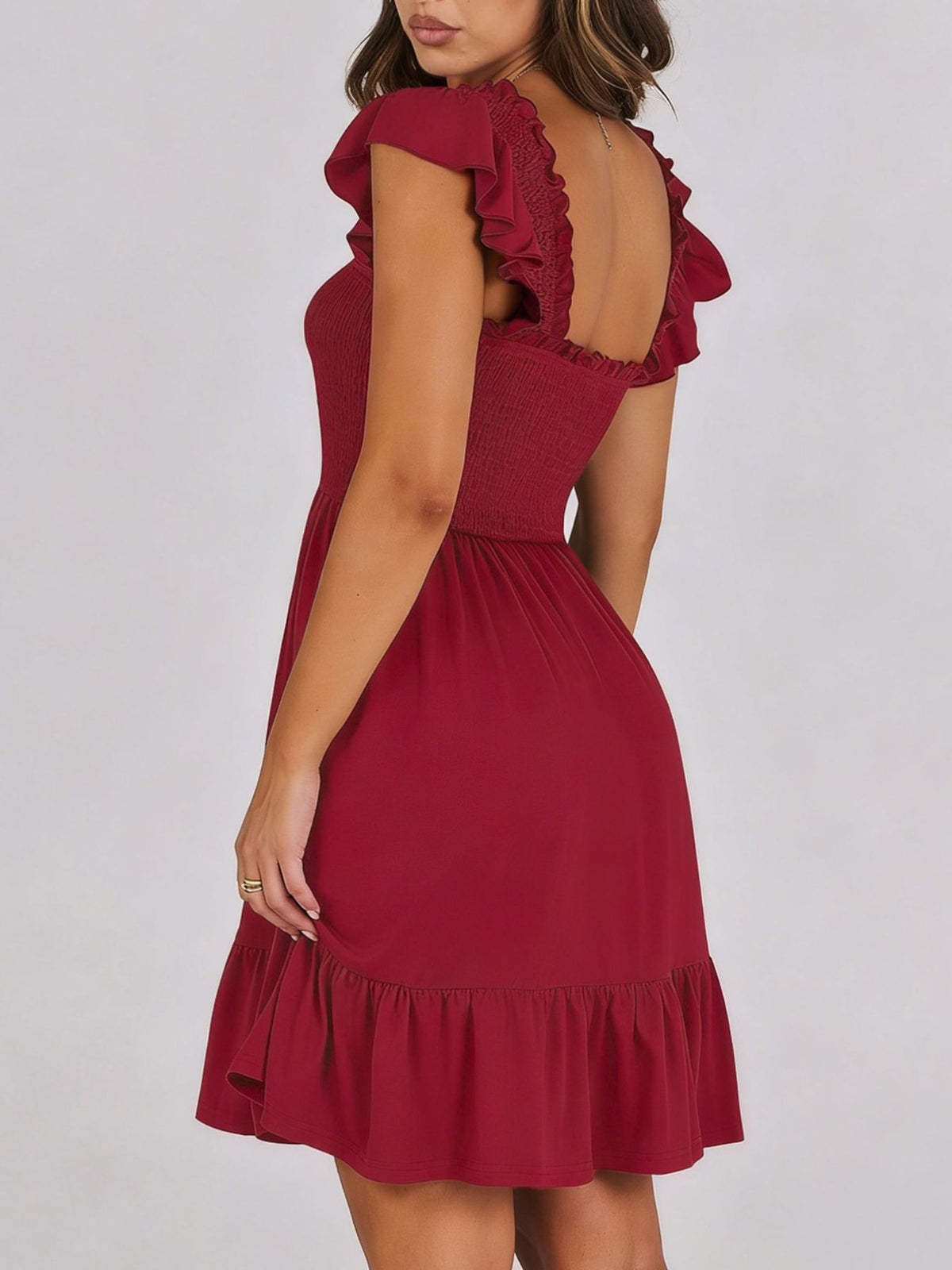 Women's lightweight summer dress by Plush Fashion Hub with smocked bodice, ruffle hem, mini length, casual style.