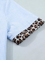 Women's leopard print short sleeve dress with contrast collar, stylish and comfortable fashion top by Trendsi.