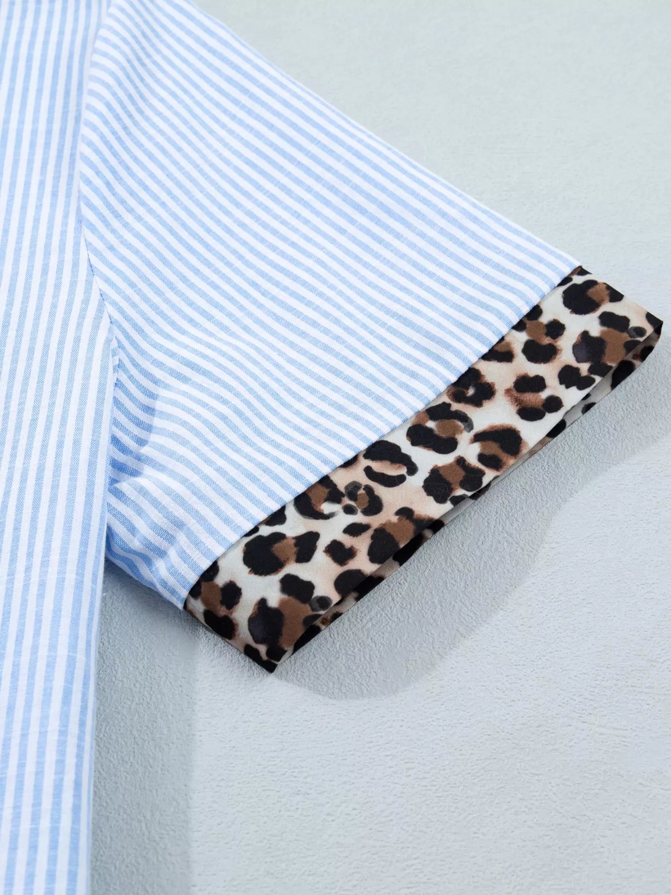 Women's leopard print short sleeve dress with contrast collar, stylish and comfortable fashion top by Trendsi.