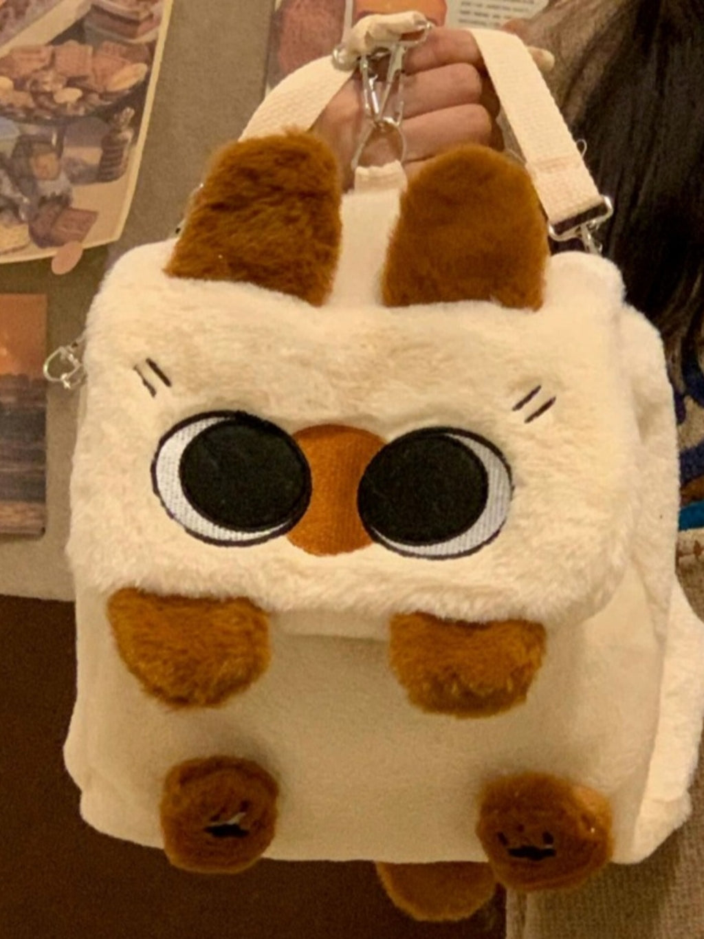 Soft plush whimsical cat mini backpack with woolen texture, featuring a cute cat face design, perfect for trendy fashion and storage.