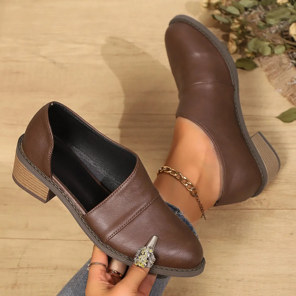 Women's point toe block heel pumps from Trendsi featuring sleek design and stylish heels, perfect for dressy or casual occasions.