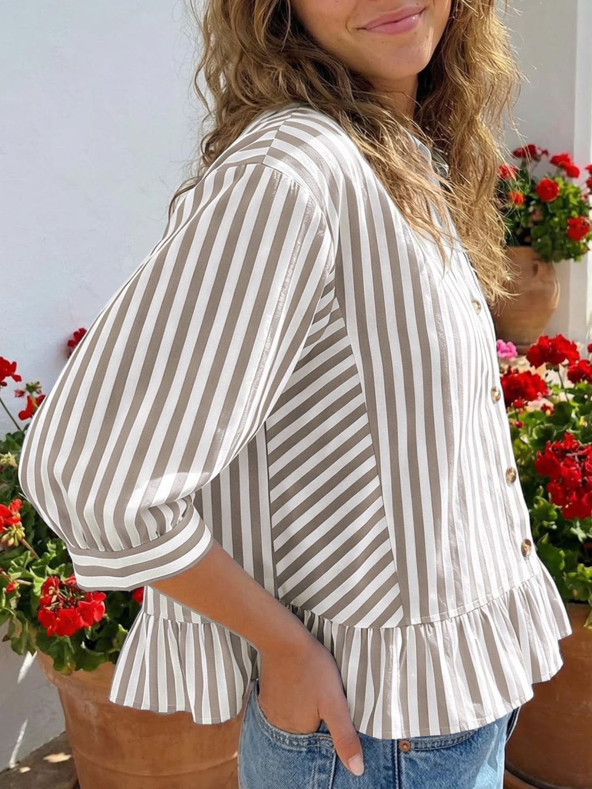 Women’s striped button-down blouse by Plush Fashion Hub, lightweight viscose with ruffled hem, featuring a classic collar and long sleeves.