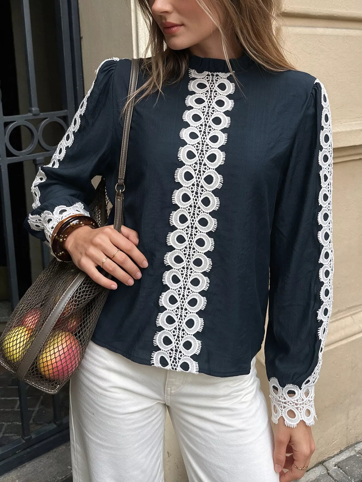 Lace trim long sleeves blouse in soft fabric with delicate lace details, stylish and elegant for versatile everyday wear.