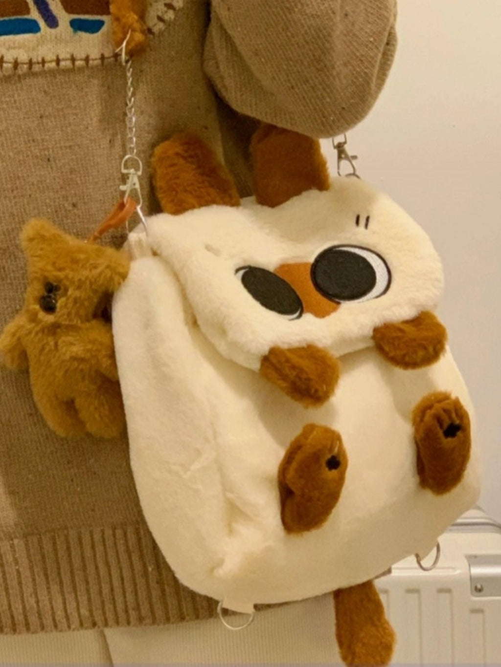 Whimsical plush cat mini backpack by Trendsi featuring soft woolen material and cute feline design.