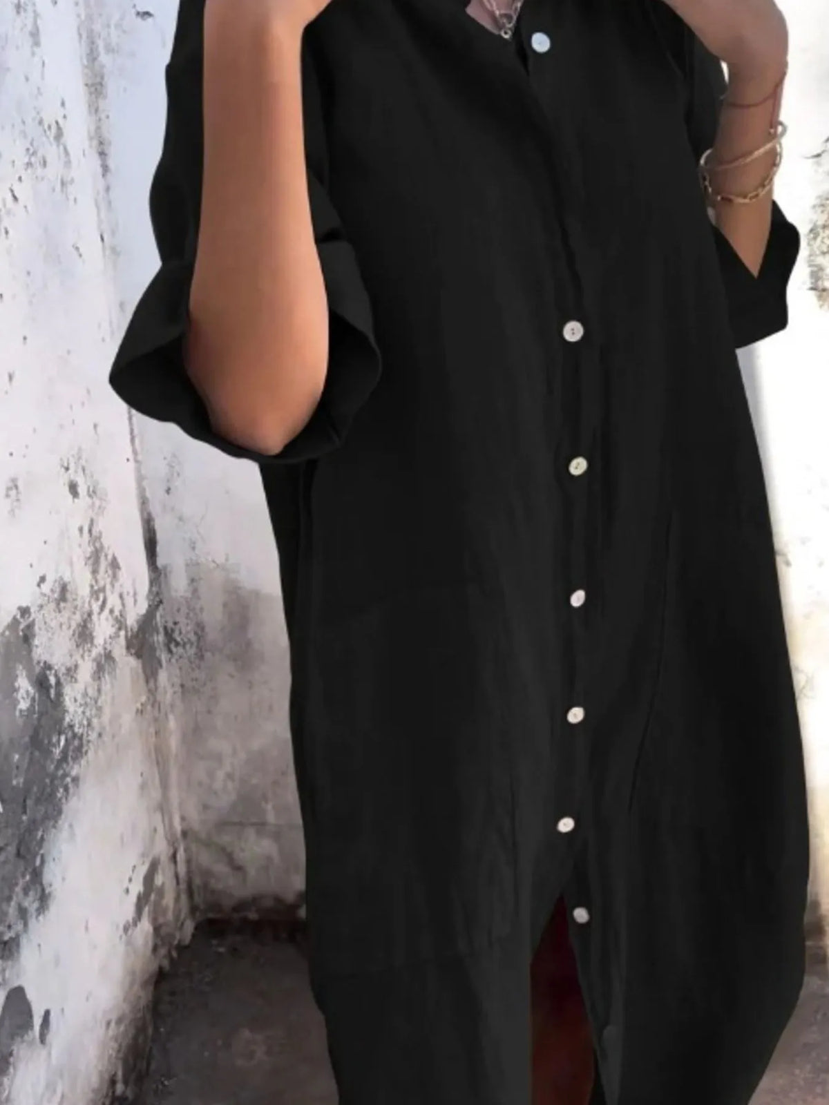Plus size linen button-down shirt dress by Trendsi, casual full-size dress with a collar, long sleeves, and front buttons.