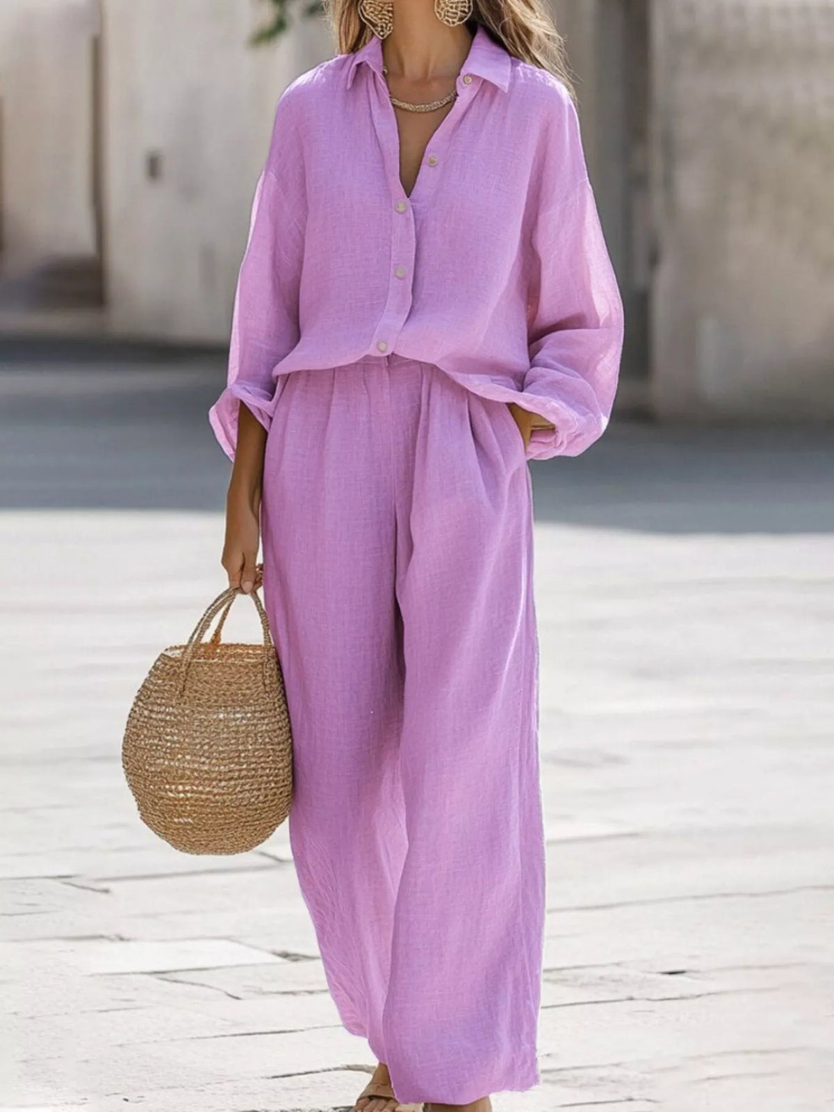 Plus size loose fit shirt and wide leg pants matching set by Trendsi, featuring a relaxed blouse and flowy trousers.