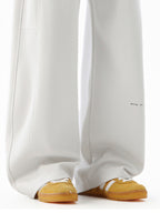 Men's wide leg casual drawstring pants by Trendsi, relaxed fit trousers with comfortable waistband, shown in a neutral fabric.