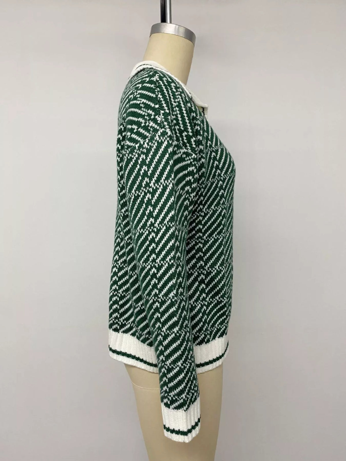 Plush Fashion Hub geometric patterned sweater with a collared design, featuring bold shapes and a cozy knit texture.