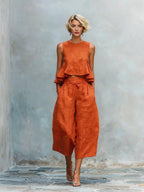 Women's linen-blend sleeveless two-piece set with ruffled detailing from Plush Fashion Hub, featuring a relaxed fit and stylish design.