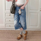 Eprolo washed bleached wide-leg straight jeans displayed flat with distressed details and frayed hems, showcasing relaxed fit and casual style.