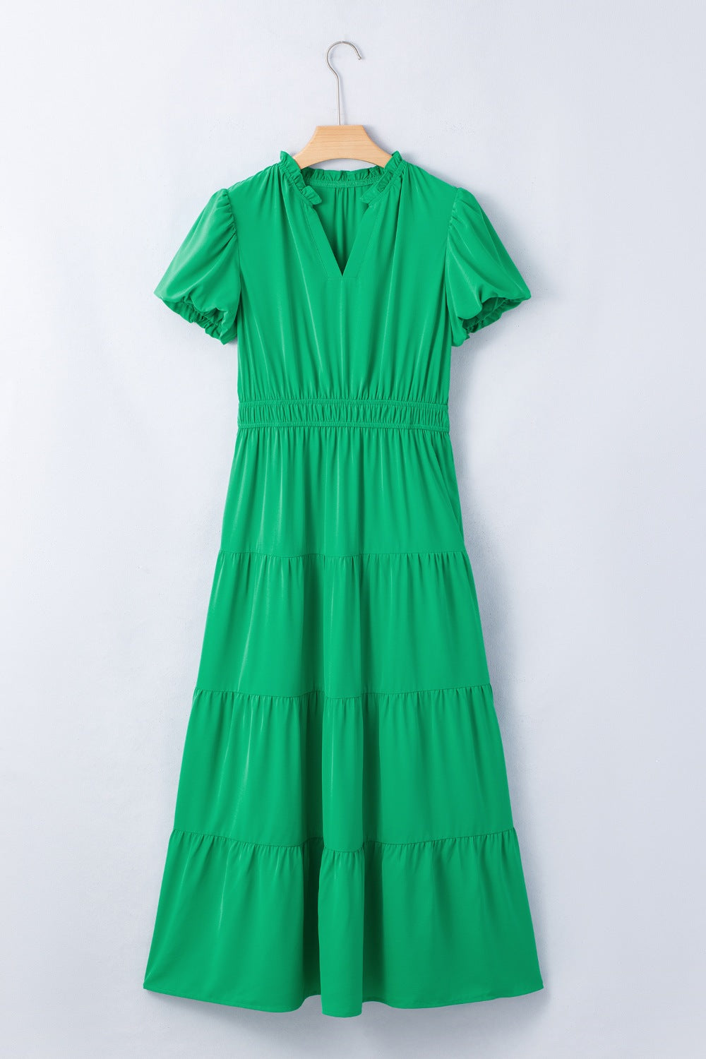 Women's floral ruffled tiered puff sleeve maxi dress by Trendsi, elegant long dress with a flowy silhouette and floral pattern.