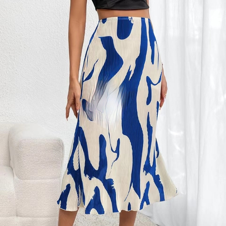 Women's zebra print pleated casual skirt by FitiqueFit with irregular hem and side slit, showcasing the stylish pattern and flowy design.