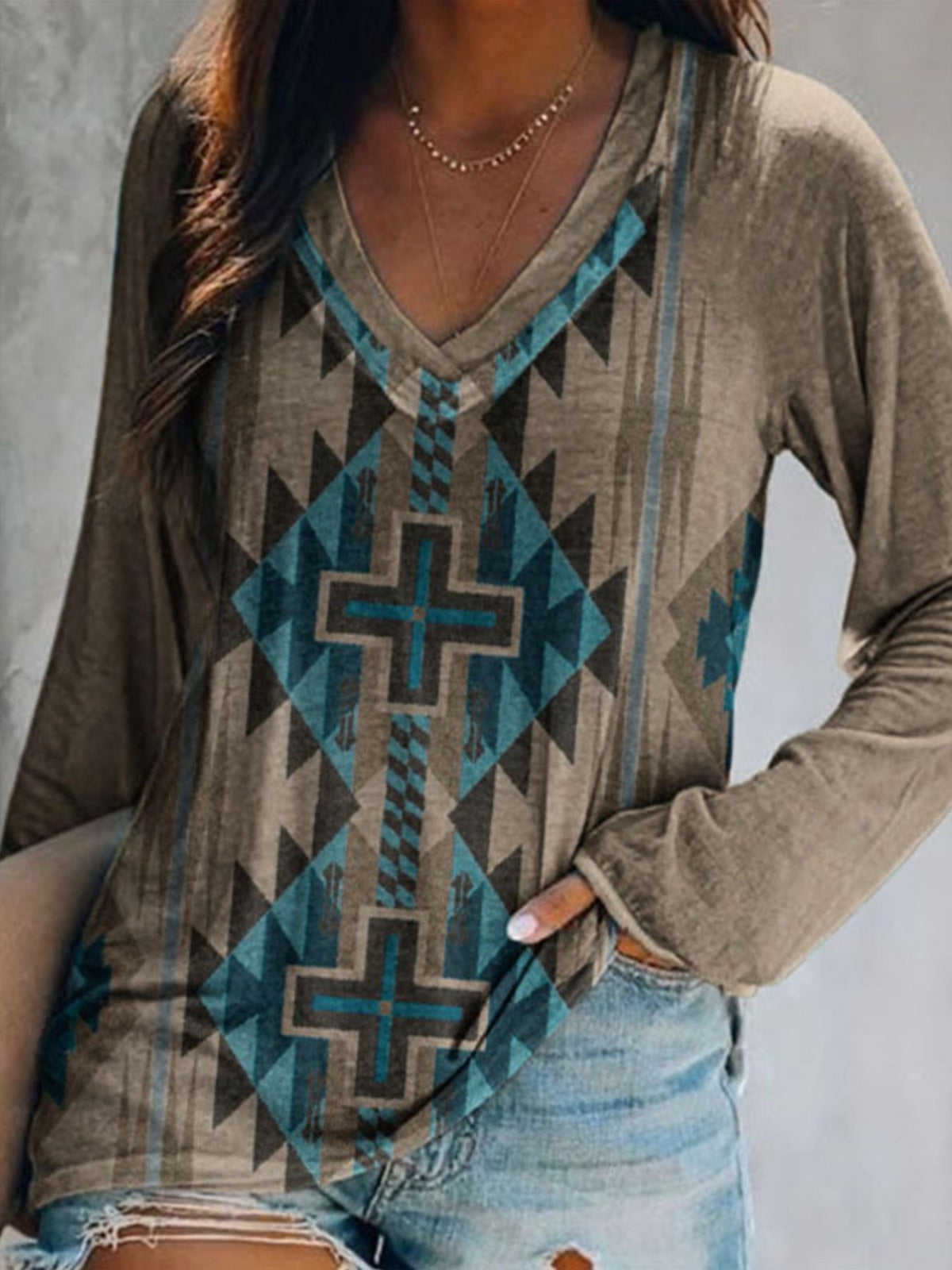 Plus size geometric print V-neck long sleeve T-shirt from Plush Fashion Hub, casual top with modern design and comfortable fit.