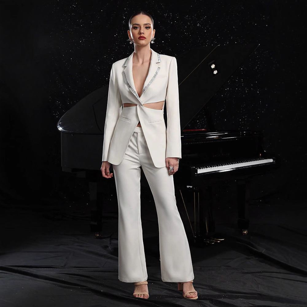 Women's elegant hollow-out long-sleeve suit jacket and pants set by FitiqueFit, stylish and sophisticated for formal occasions.