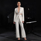 Women's elegant hollow-out long-sleeve suit jacket and pants set by FitiqueFit, featuring stylish cut-out details and tailored fit.