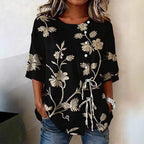 Women's floral 3D print pullover top by Plush Fashion Hub, loose fit casualwear, featuring a vibrant floral pattern and relaxed style.