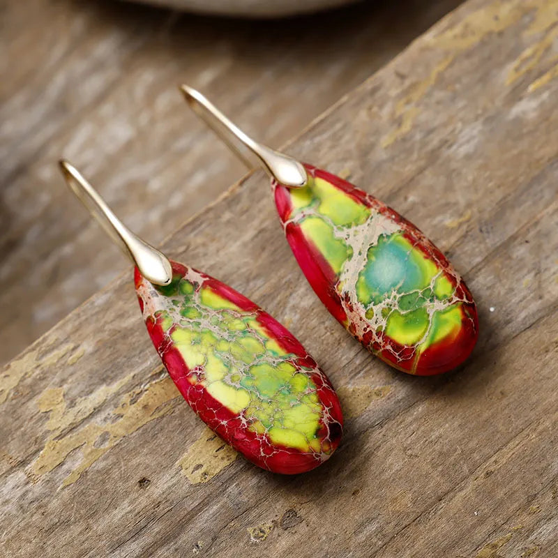 Natural stone teardrop dangle earrings from Plush Fashion Hub featuring elegant hanging teardrop designs for fashion accessories.