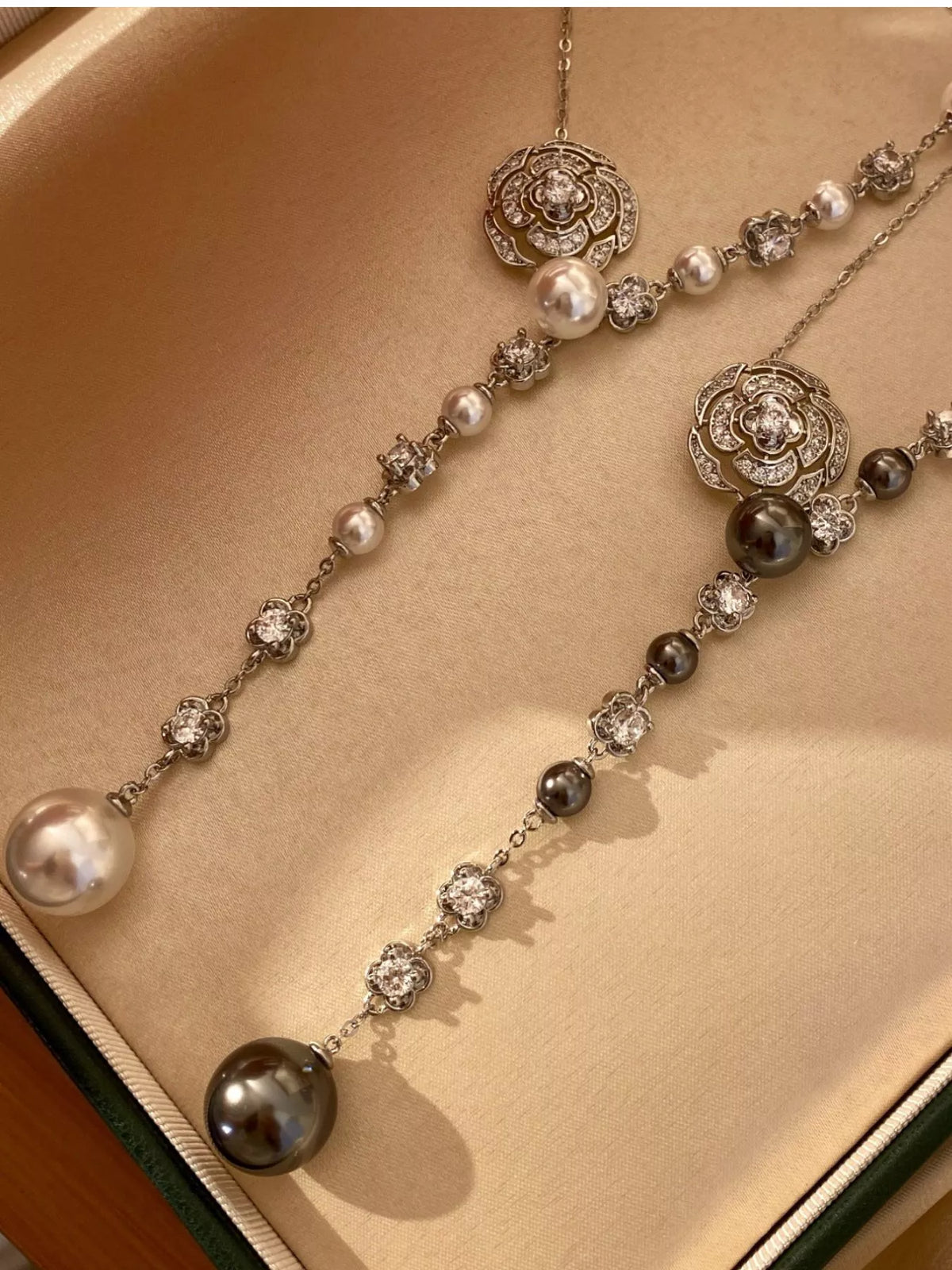 Pearl flower Y-necklace from Plush Fashion Hub featuring a elegant design with pearl and floral accents.