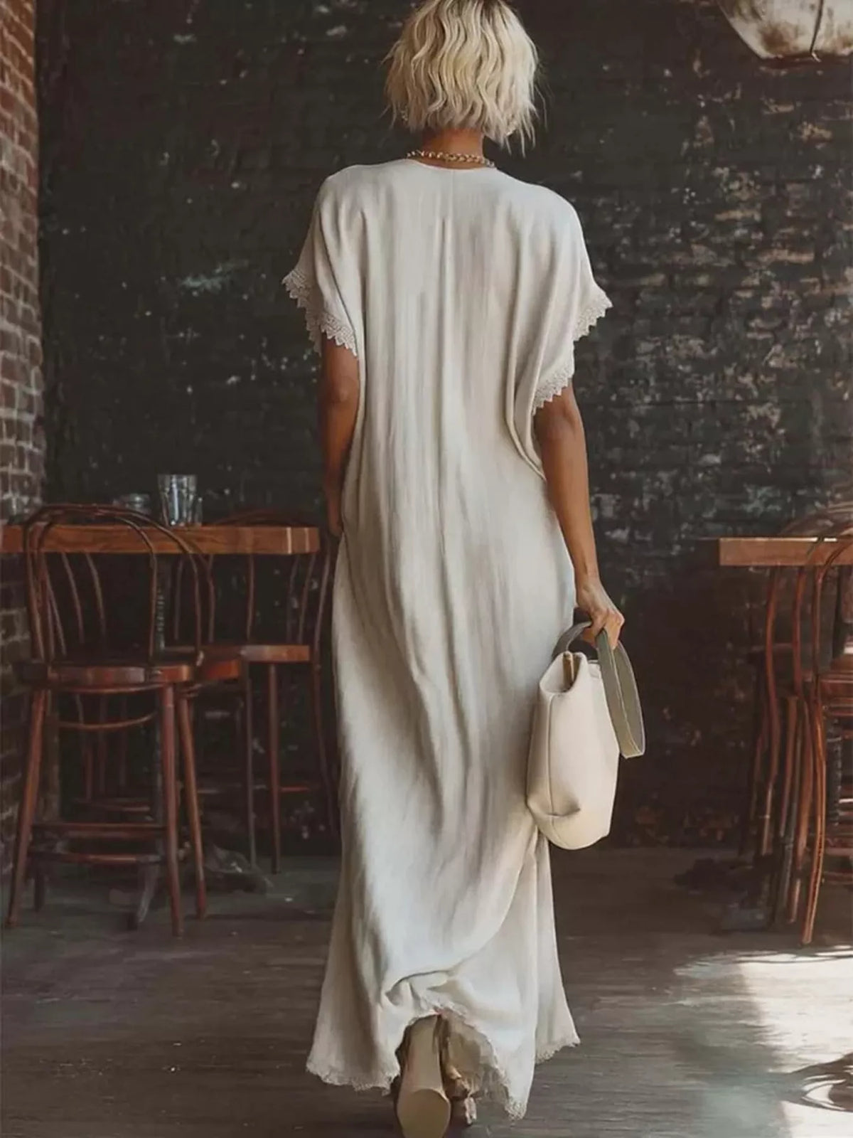 Plus size maxi dress by Plush Fashion Hub featuring a V-neck with lace trim and a full-length design.