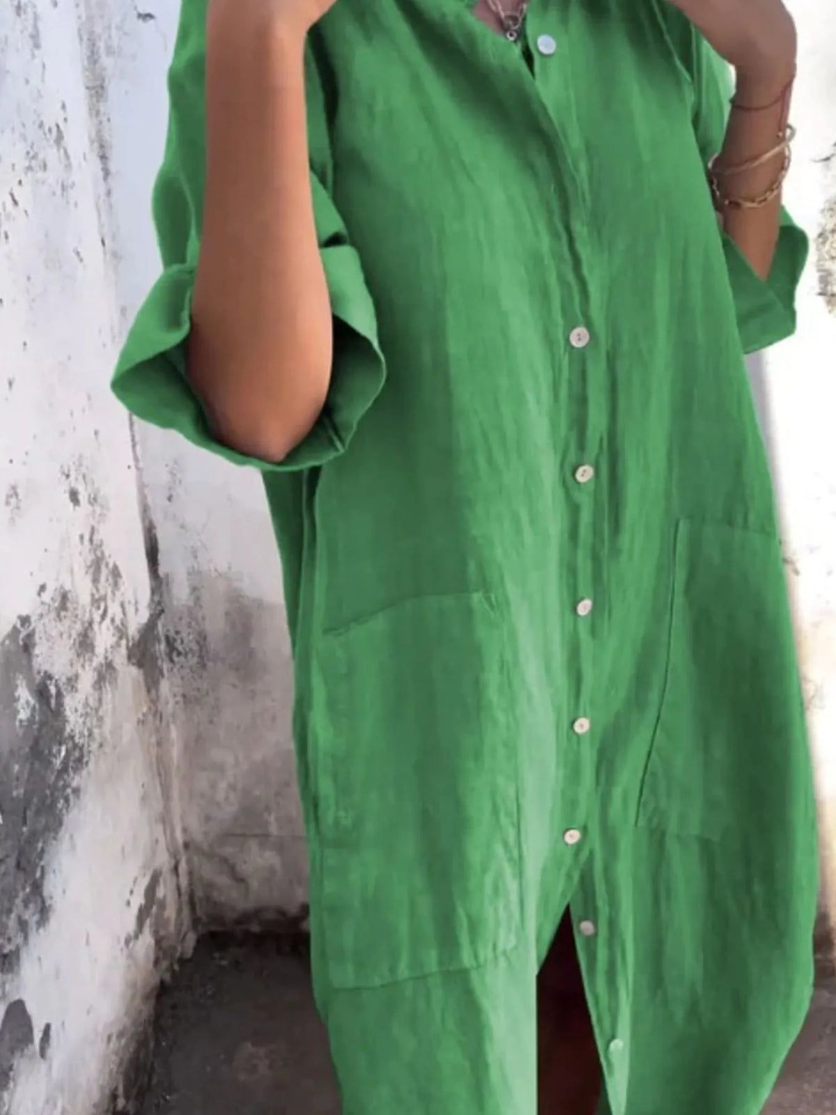 Plus size casual linen button-down shirt dress by Trendsi, shown in a full-length view, featuring a relaxed fit and classic collar.