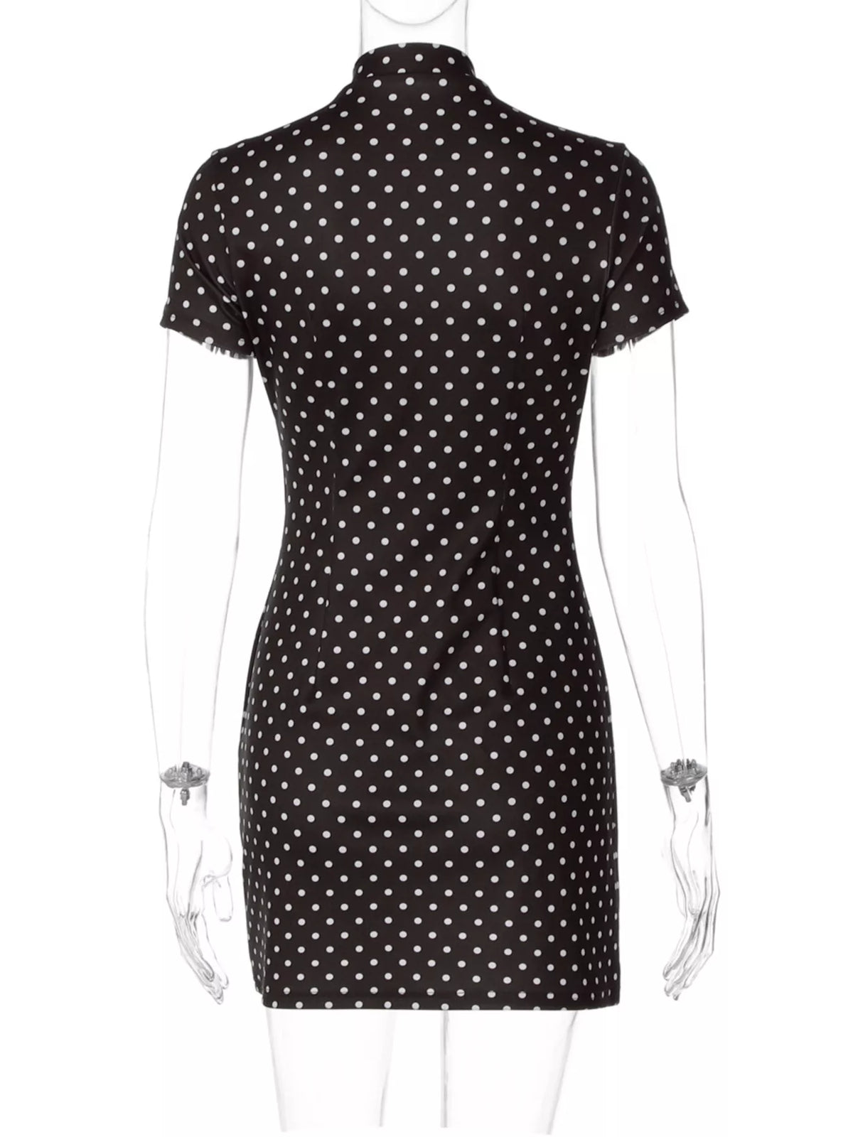 Polka dot cut-out front mini dress by Plush Fashion Hub, featuring a stylish polka dot pattern and modern design.