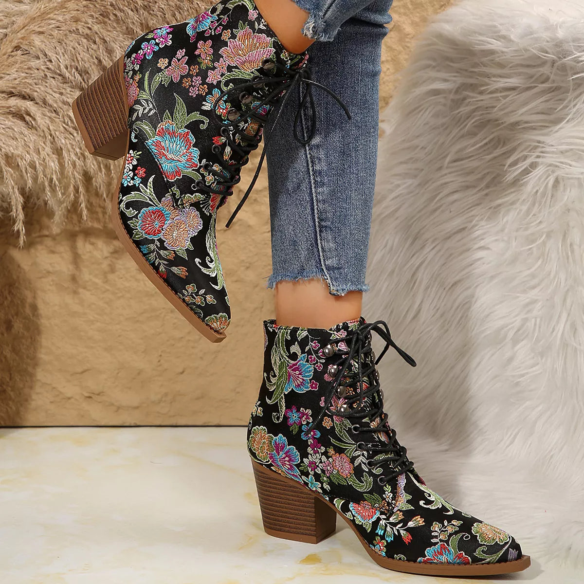 Point toe block heel boots from Trendsi featuring sleek footwear design with a stylish pointed toe and chunky heel.