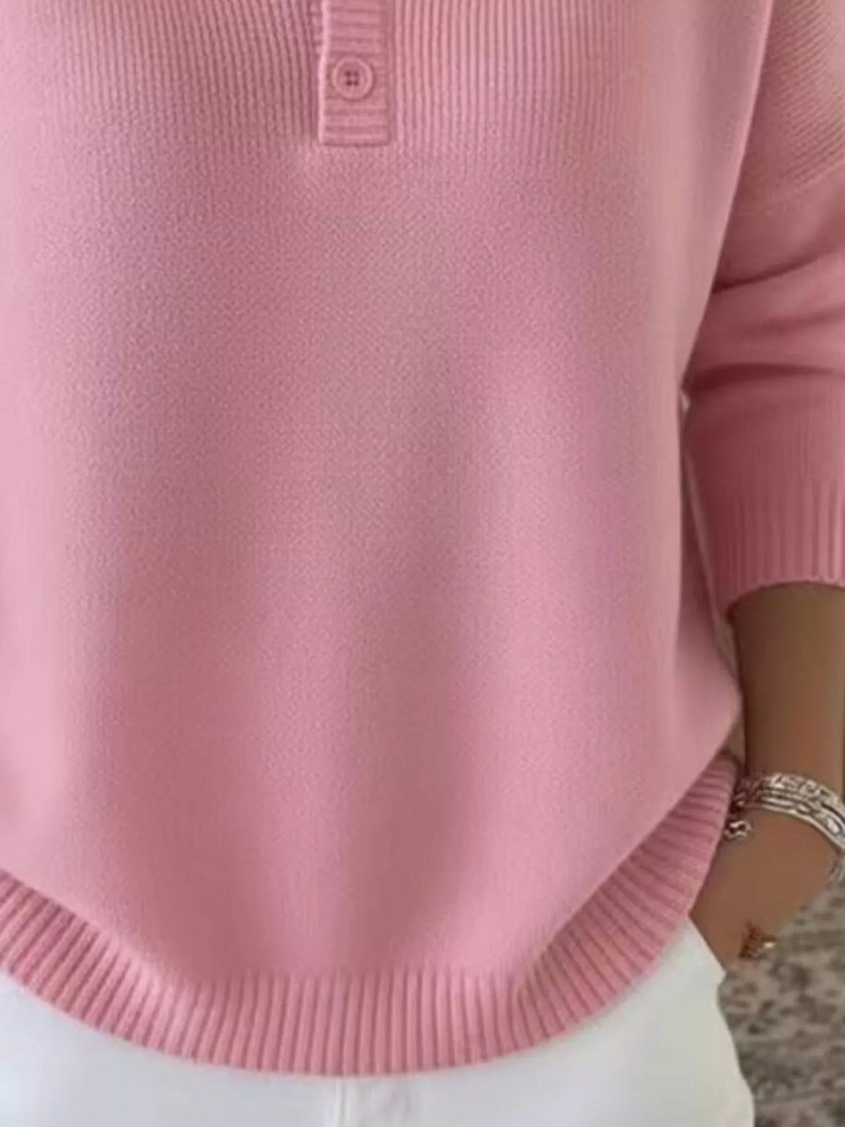 Plus size ribbed knit sweater with button details, featuring a fitted design from Trendsi, perfect for casual and cozy wear.