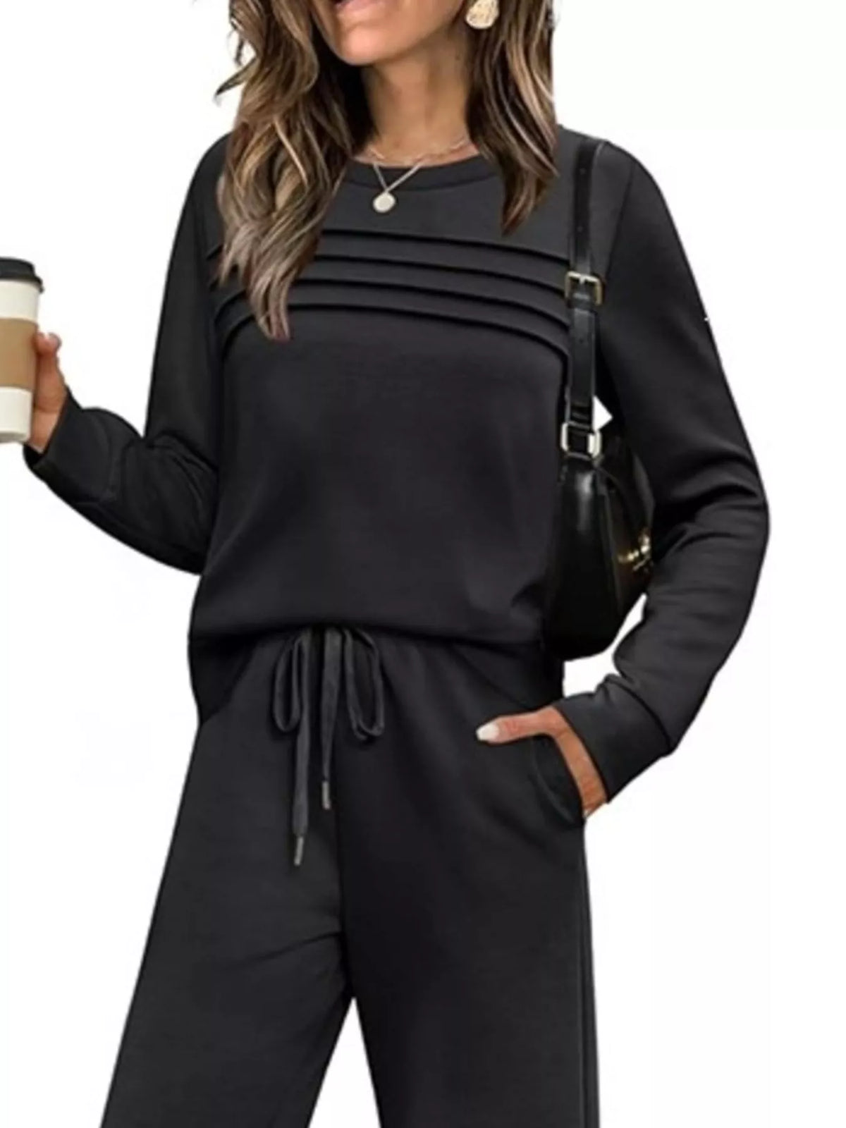 Plus size casual long sleeve crewneck top and drawstring pants matching set by Trendsi, shown in a relaxed fit with soft fabric.
