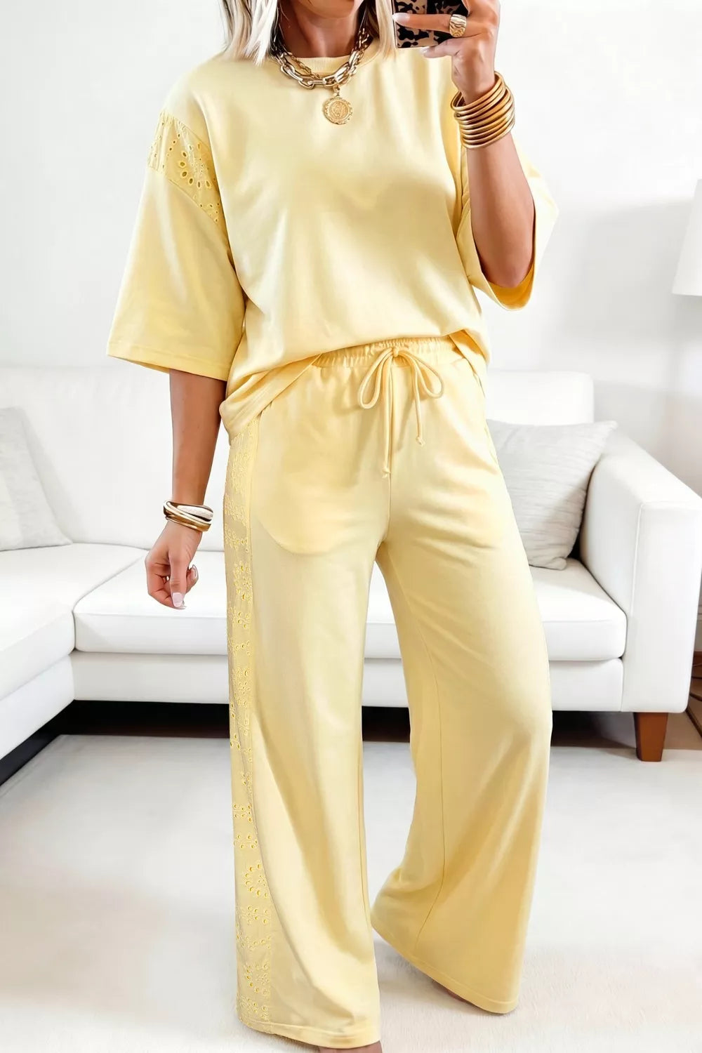 Trendsi rings half sleeve top and drawstring pants set, featuring silver rings embellishments on the fabric, casual and stylish clothing.