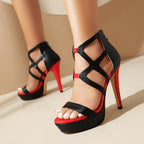 Black and red platform heels with bold strappy design, women's shoes from Trendy Attic Store01.