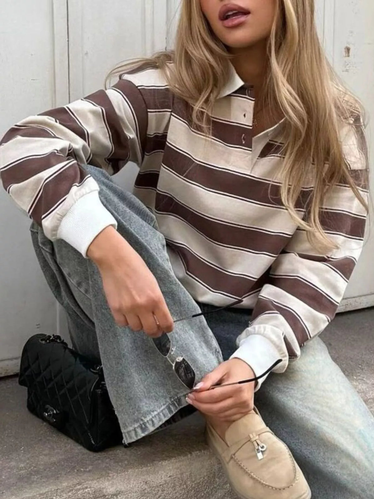 Striped long sleeve polo shirt with button details from Plush Fashion Hub, featuring a classic collar and casual fit.