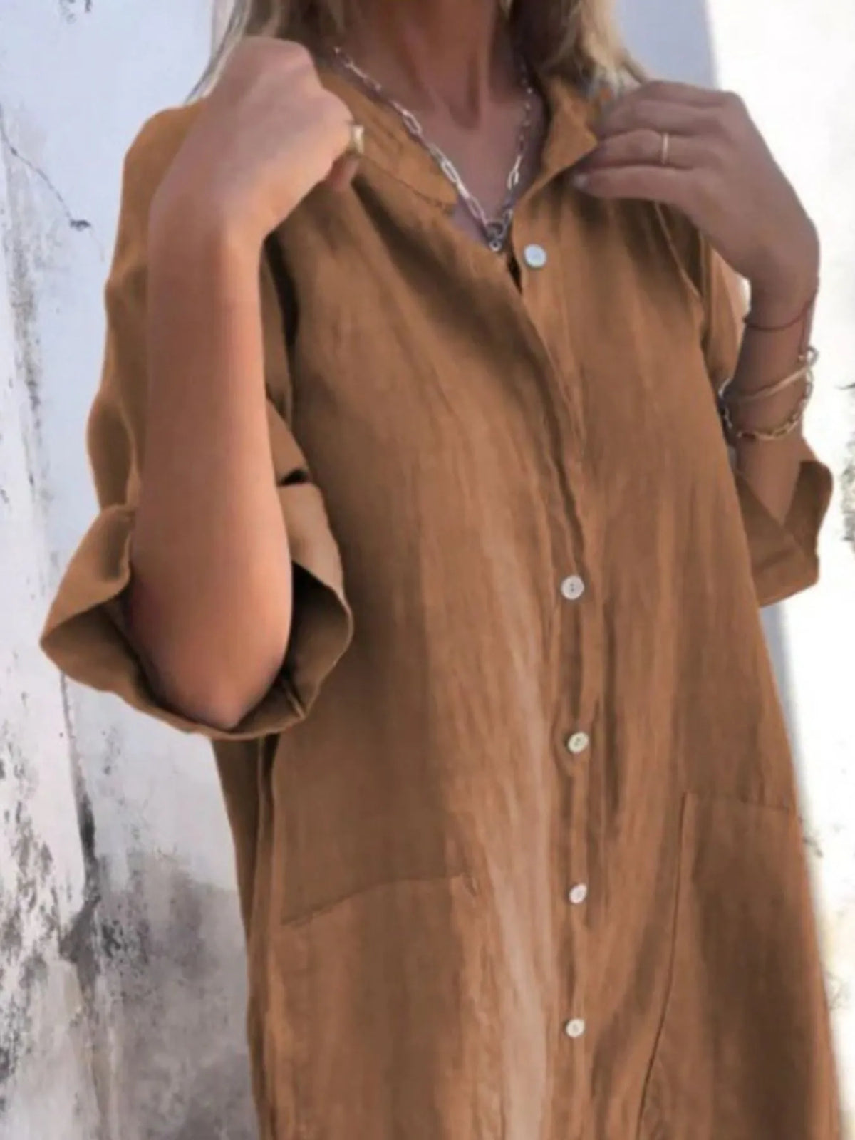 Plus size linen button-down shirt dress from Trendsi, casual full-length dress with collar and long sleeves, relaxed fit.