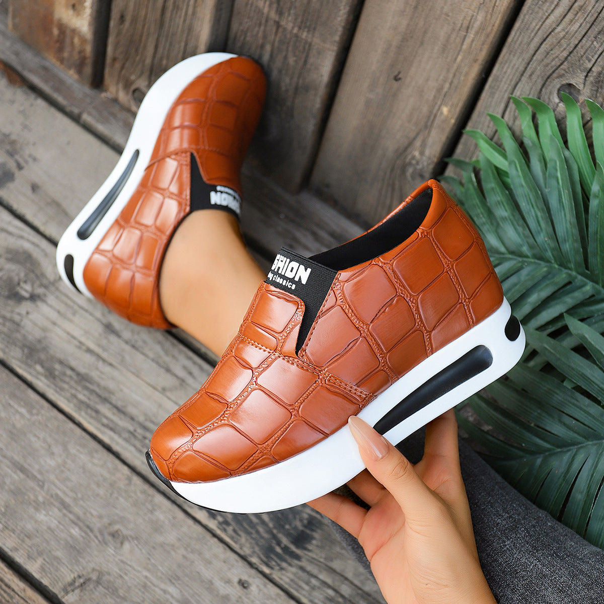 Women's faux leather crocodile pattern platform slip-on sneakers by Plush Fashion Hub, showcasing stylish design and textured surface.