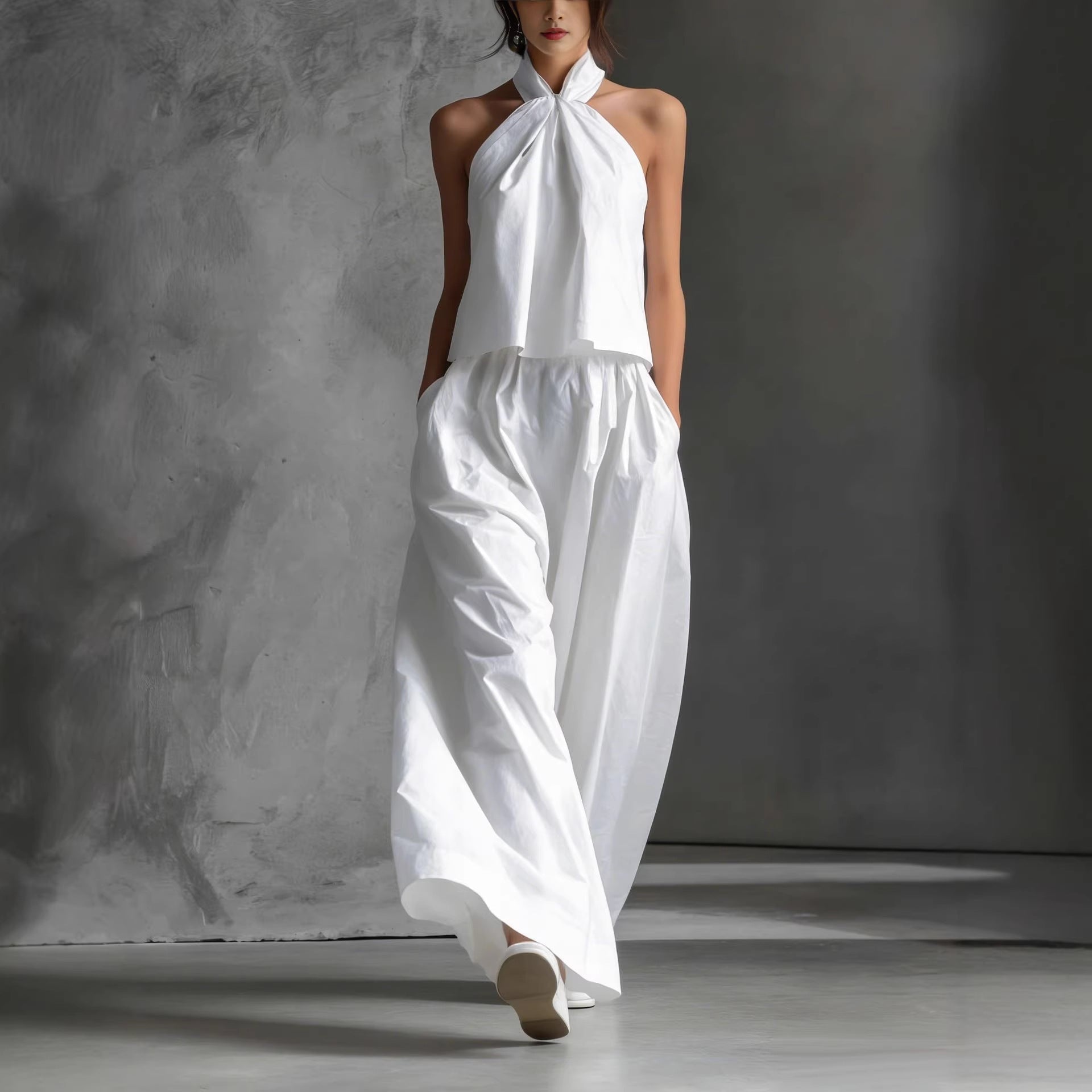 Women's loose sleeveless casual top and high-waist wide-leg pants set by FitiqueFit in four colors, styled together for a relaxed look.