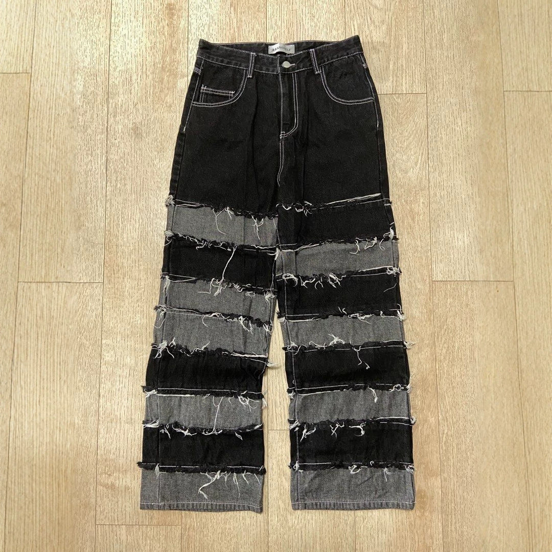 Women's deconstructed black and gray patchwork denim jeans with straight fit from Plush Fashion Hub, showing front view and distressed details.
