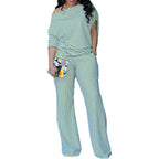 Eprolo asymmetrical off-shoulder two-piece set featuring stylish tops with unique hem details and trendy design.