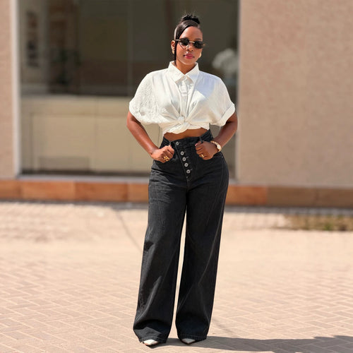 Women's black denim jeans with multi-button fly and straight leg fit, stylish eprolo brand jeans in the image.