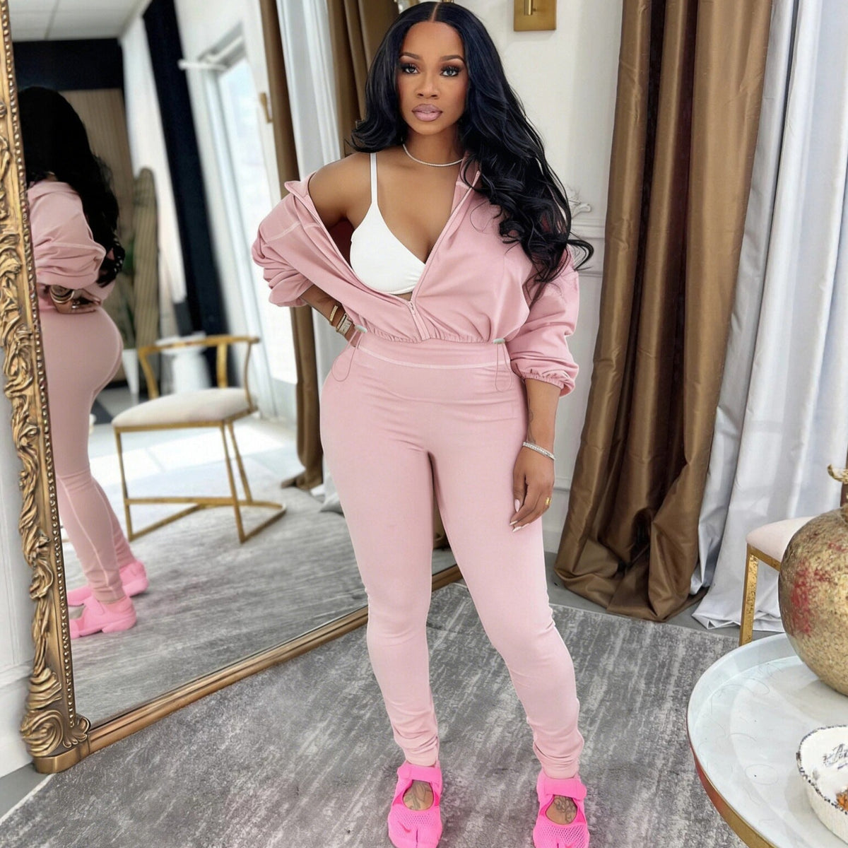 Plush Fashion Hub modern zip-front long sleeve two-piece set featuring a stylish top with a front zipper and matching fitted pants.