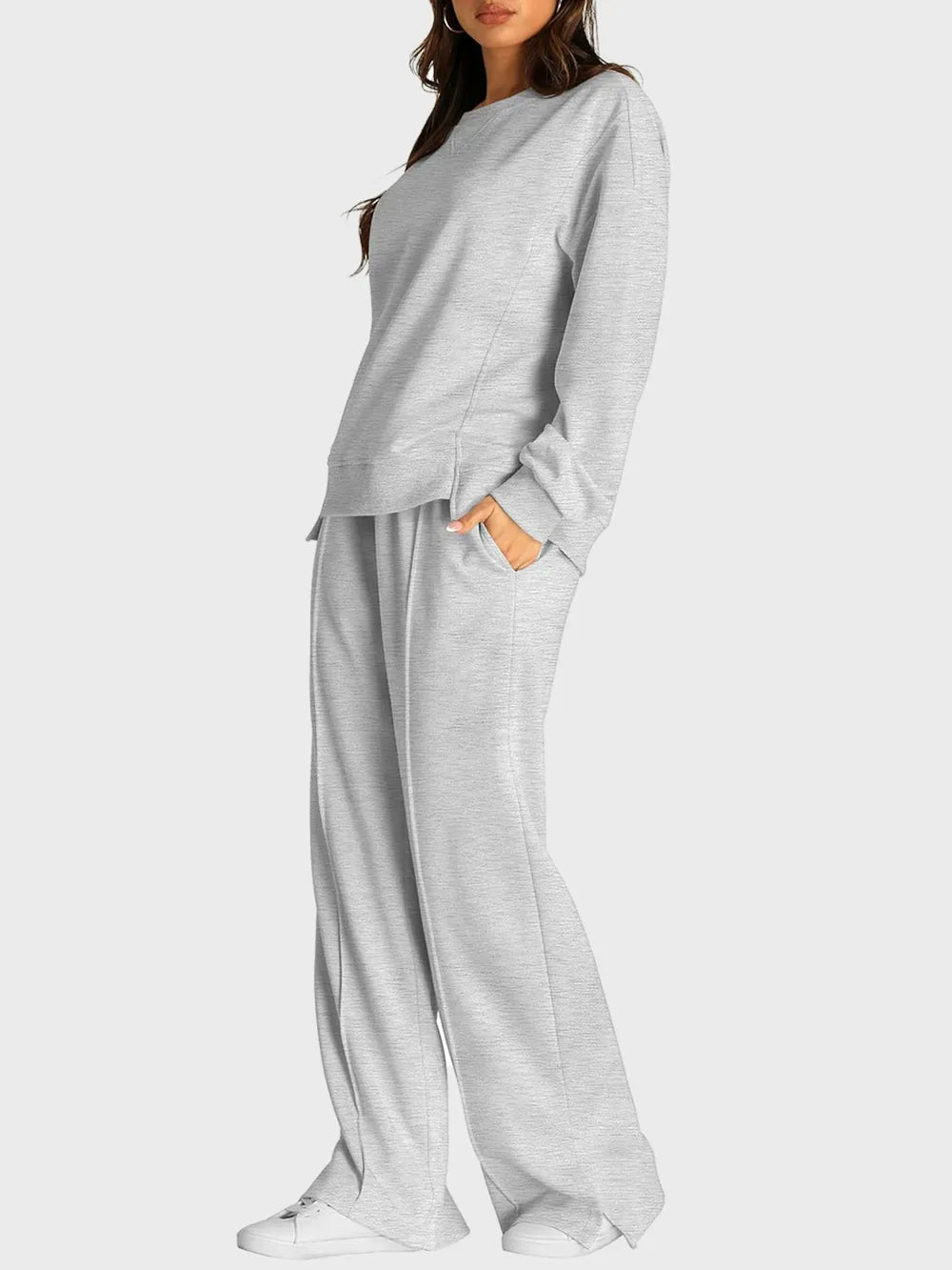 Trendsi round neck long sleeve top and slit pants set, stylish casual outfit with a fitted top and flowy slit pants.