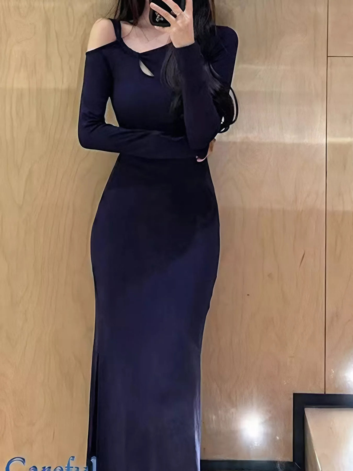 Plush Fashion Hub asymmetrical cutout long sleeve midi dress in sleek stretch fabric, showcasing a modern, stylish design.